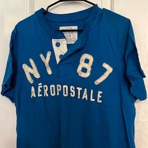 1987 Aeropostale blue shirt with white lettering. LIKE NEW